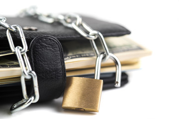 Business safety or financial protection or allow access. Heap of money in chain with open padlock...