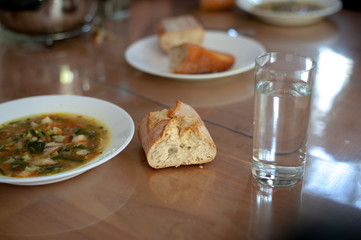 soup with bread and water