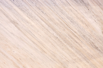 Natural pink stone, marbled texture with diagonal white streaks