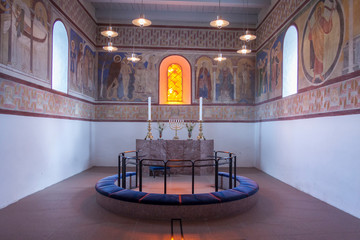 Interior of white church in Jelling, Denmark.