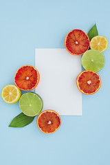 Top view citrus fruits with paper