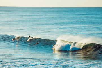 Surfers and Waves at Bells Beach, Australia