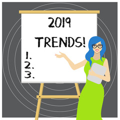 Writing note showing 2019 Trends. Business concept for general direction in which something is developing or changing