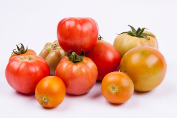 Red tomatoes - white background.