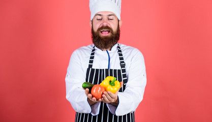 Man cook hat apron hold fresh vegetables. Buy fresh vegetables grocery store. Vegetarian restaurant. Hipster chief chef vegetarian cafe. Vegetarian recipe concept. Choose vegetarian lifestyle