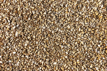 Macadam of limestone for road surface close up, crushed limestone aggregate.