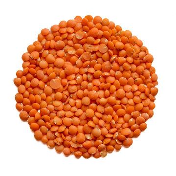 Red Lentil or Masoor dal isolated on white background.