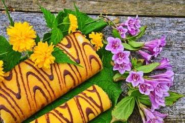 Tasty roll on a board.