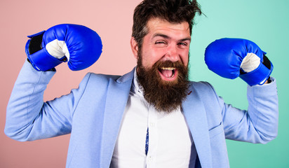 Business strategy. Fighting for business success. Businessman in formal suit ready to attack or...