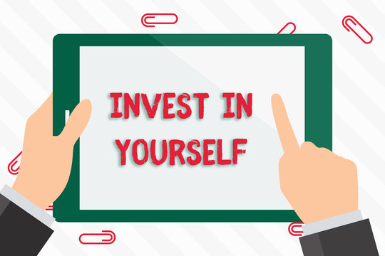 Text sign showing Invest In Yourself. Business photo showcasing learn new things or materials thus making your lot better Businessman Hand Holding, Pointing and Touching Colorful Tablet Blank Screen
