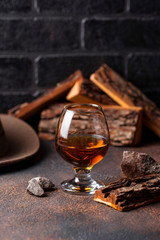 Glass of cognac or whiskey.