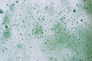 Full frame image of a bubbles or foamy soapy water for background. Concept of abstract and hygiene