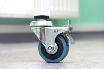 Small wheel of the treatment table close-up