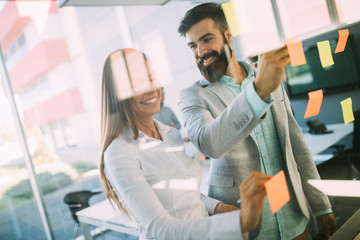 Business people planning strategy in office together