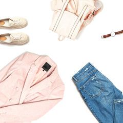 Stylish feminine spring clothing white shirt, blue jeans, pink corduroy jacket, beige espadrilles, backpack, watches on white background. Trendy hipster look. Female background blog concept Flat lay