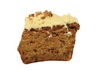 Piece of homemade carrot cake on white isolate background.