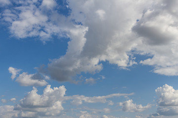 blue sky with tiny clouds