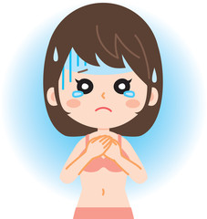 胸を押さえる女性