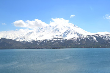 snowy mountains  and lake