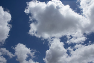 Fototapeta na wymiar white fluffy clouds