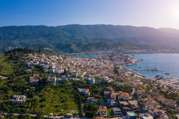 Amazing panoramic view of Porose Greece. Sunny day in Greek island. Aerial photo panoramic. Flyig with birds.