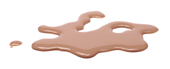 Chocolate milk puddle isolated on white background