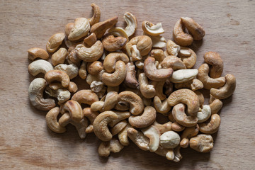 Cashews on a wooden surface. Roasted Cashew Nuts