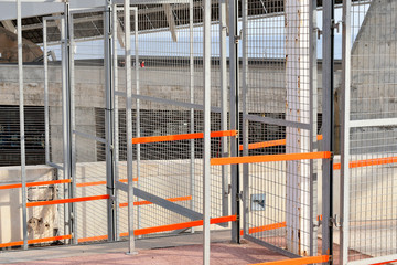 Fototapeta na wymiar metal mesh fences, urban landscape
