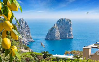 Daylight view of famous Faraglioni Rocks, Capri Island, Italy