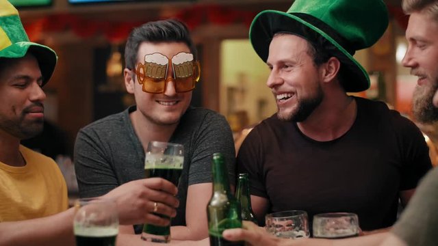 Men with leprechaun's hat and beer celebrating Saint Patrick's Day