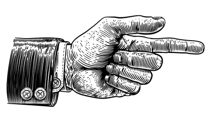 Fotobehang A hand pointing a finger in a direction sign. Wearing a business suit in a vintage antique engraving woodblock or woodcut style. © Christos Georghiou