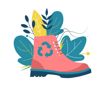 Shoe recycling. Old boot and recycle symbol