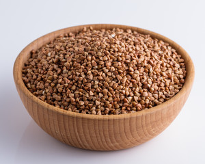 Grain buckwheat on a white acrylic background