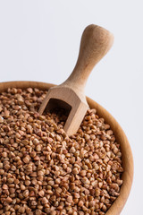 Grain buckwheat on a white acrylic background