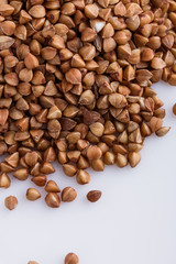 Grain buckwheat on a white acrylic background