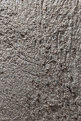 Wall of sand and concrete as an abstract background