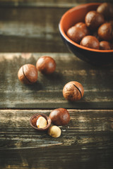 Macadamia nuts on wooden table