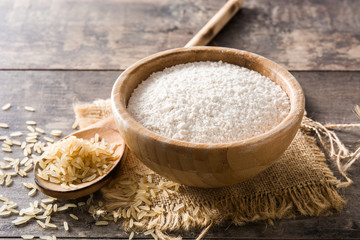 White rice flour in a bowl on wooden table