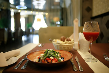fork and knife serving in the interior of the restaurant / table in a cafe, food industry catering, menu