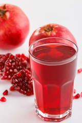 grains of a grenade on a white acrylic background