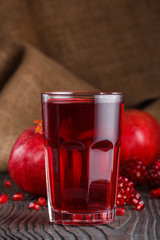 grains of a grenade on a dark rustic background