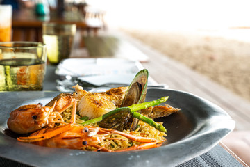 Paella sea food beside the sea