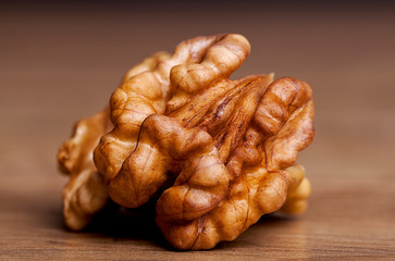  Walnut on wooden table. Healthy food and snack.
