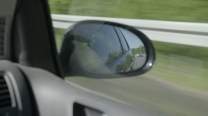 Following Spy Car in Back Mirror