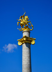 Fototapeta na wymiar Golden statue of St. George in Tbilisi, Georgia