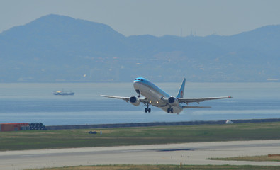 Fototapeta na wymiar Airplane taking-off from Kansai Airport