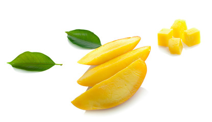 Fototapeta na wymiar Mango fruit slices and mango leaves over white. File contains clipping paths