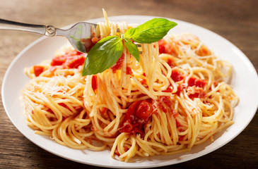 plate of pasta with tomato sauce