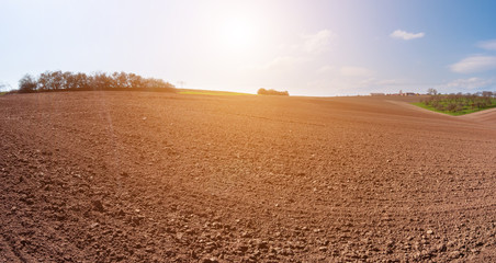 Fototapeta na wymiar spring plowed fields for agriculture
