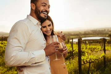Fotobehang Couple spending time together on a romantic date in a vineyard © Jacob Lund